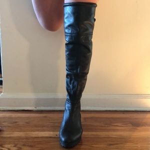 Over the knee black leather boots